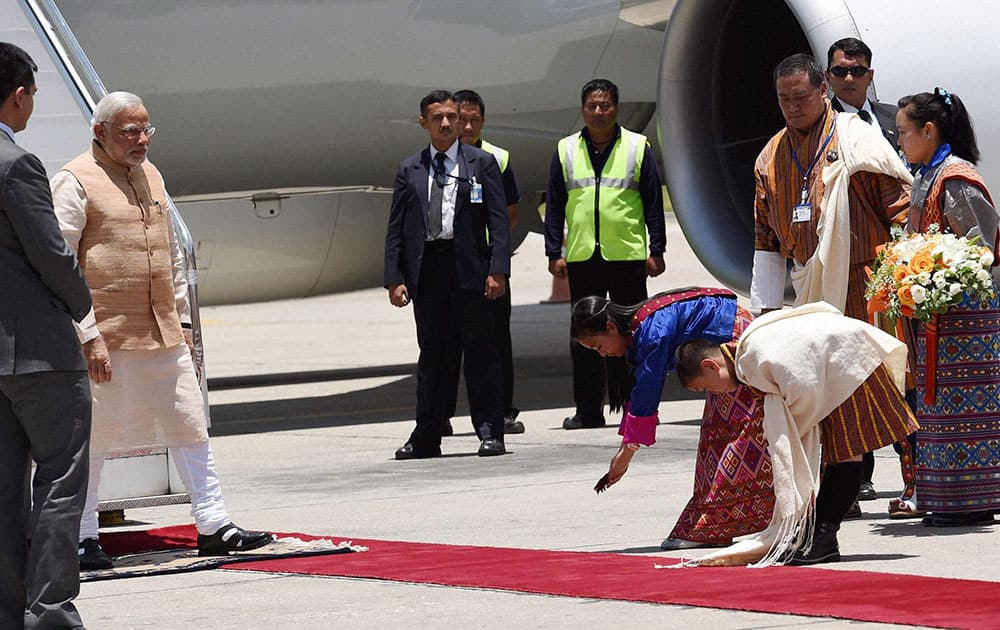 Prime Minister Narendra Modi being accorded traditional welcome on his arrival at the Paro International Airport in Bhutan.