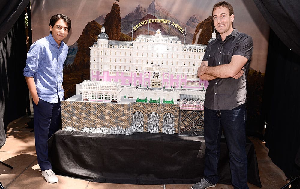 Actor Tony Revolori and builder Ryan Ziegelbauer unveil a remarkable model inspired by Wes Anderson`s `The Grand Budapest Hotel` and constructed entirely of Lego bricks at The Grove in Los Angeles.