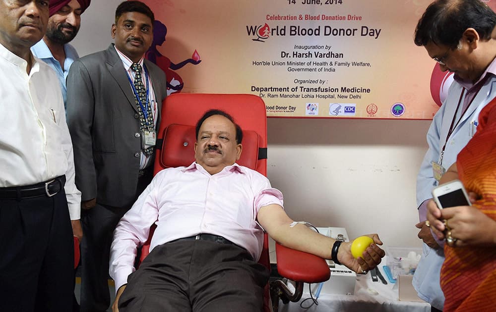 Union Minister for Health and Family Welfare, Harsh Vardhan donating blood during the inauguration of `Blood Donation Drive` on the occasion of ``World Blood Donor Day` at RML Hospital in New Delhi.