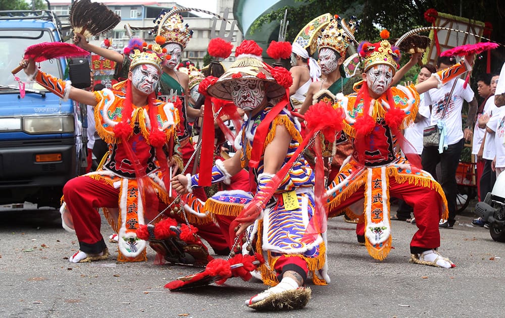 Taiwanese temple performers called `Ba Jia Jiang` take part in a temple festival in Taipei, Taiwan.