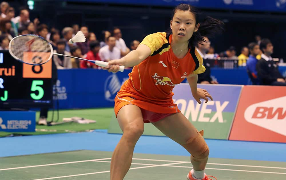 China`s Li Xuerui plays against Sung Ji-hyun of South Korea during their semifinal match of the Japan Open badminton championship in Tokyo.