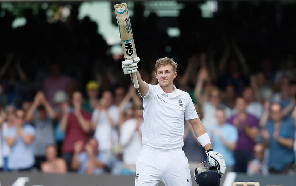 England`s Joe Root turns towards his teams dressing room as he celebrates scoring 200 runs not out against Sri Lanka on the second day of the first test cricket match between England and Sri Lanka at Lord`s cricket ground in London.