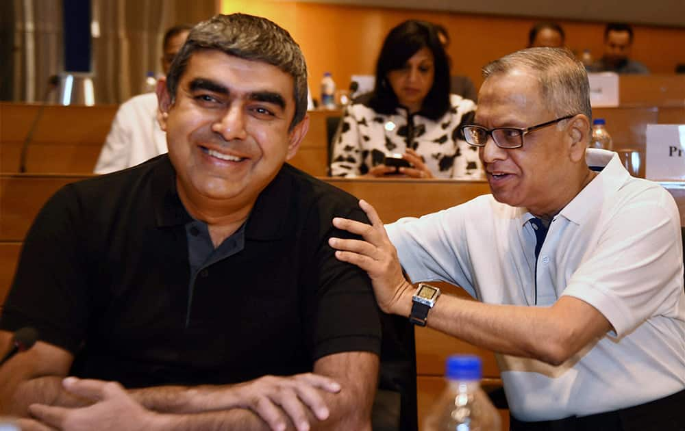 Infosys Executive Chairman N R Narayana Murthy with newly appointed CEO & MD Vishal Sikka at a press conference at Infosys headquarters in Bengaluru.