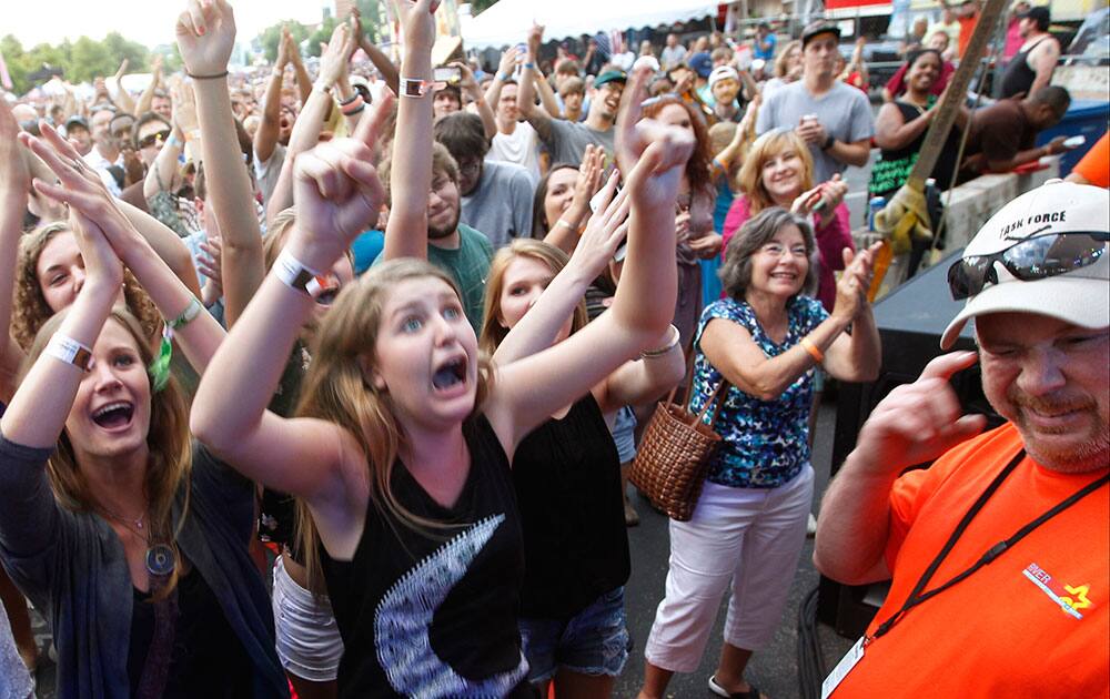 Fans cheer for musician Allen Stone at the Riverbend Festival in Chattanooga, Tenn.