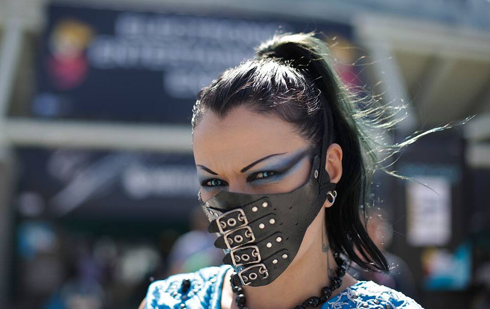 A woman who goes by Sin Fisted pauses for photos at the Electronic Entertainment Expo  in Los Angeles. 