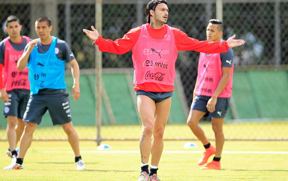 Chile`s Mauricio Pinilla complains during team training for the World Cup in Belo Horizonte, Brazil.