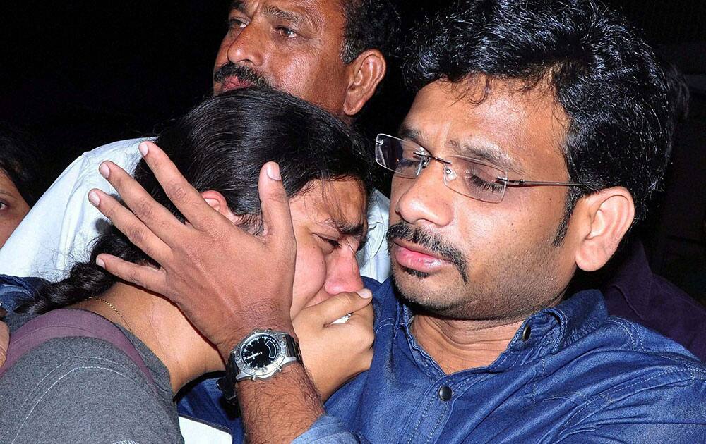 RELATIVES AND FAMILY MEMBERS MOURN AS THEY ATTEND THE LAST RITES ONE OF THE STUDENTS WHO WAS SWEPT AWAY IN BEAS RIVER AFTER RELEASE OF WATER FROM A DAM, AT HER RESIDENCE IN HYDERABAD.