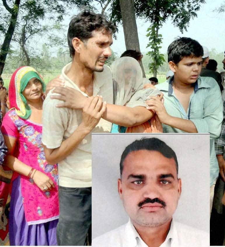 Crying family members of Om Veer Singh (inset), a former Army man and local BJP leader who was shot dead in his village, Mirapur, in Muzaffarnagar.