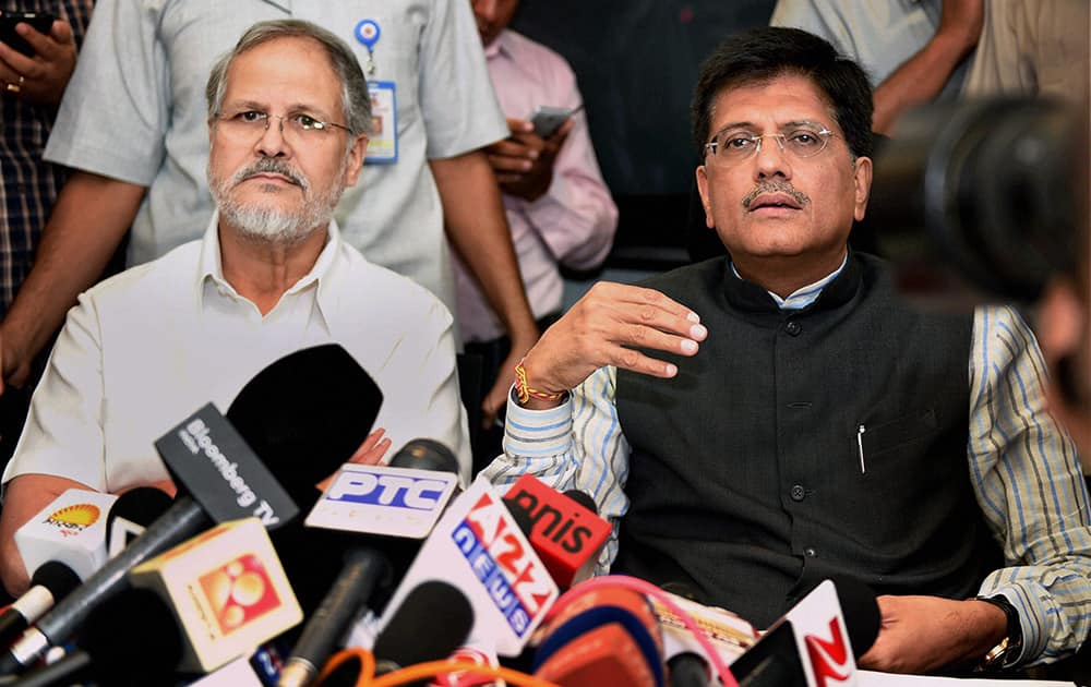 Union Minister of State for Power, Piyush Goyal withi Lt. Governor og Delhi Najeeb Jung talking to media after an emergency meeting to discuss plan of action to tackle power crises, in New Delhi.