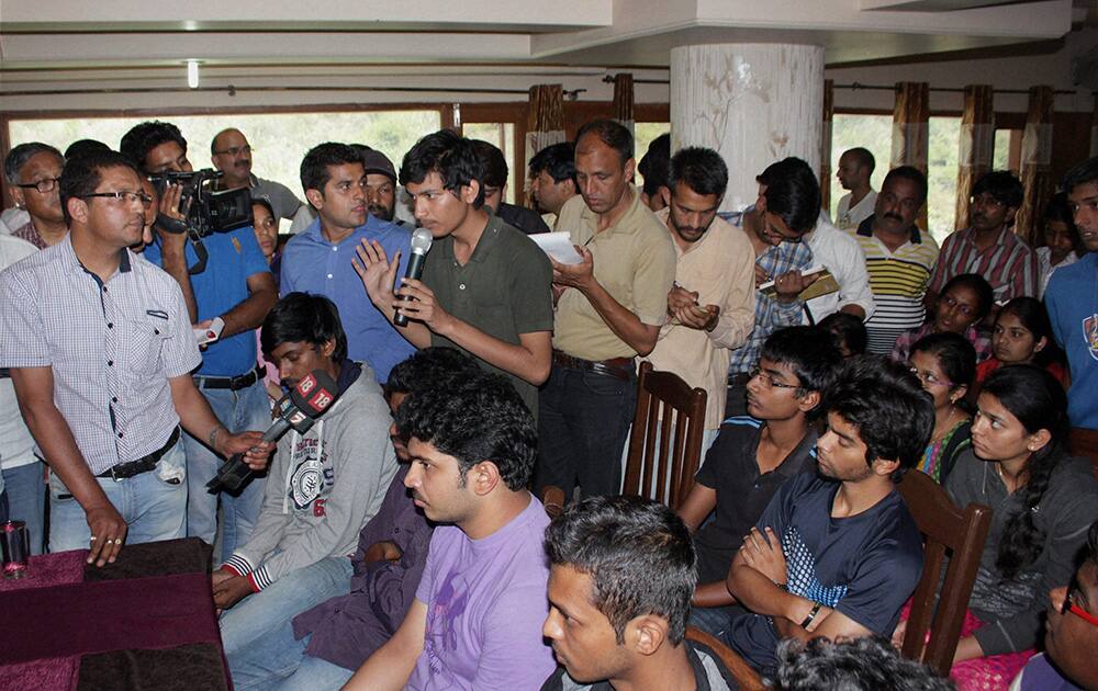 Students interact with the media regarding the Beas River tragedy in Mandi on Monday, a day after 24 engineering students were washed away in the River at Thalot.