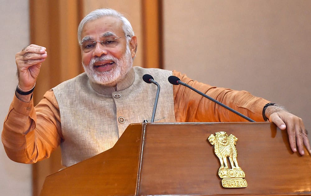 Prime Minister Narendra Modi speaks after releasing a book “Getting India Back on Track” An Action Agenda for Reform, during a function in New Delhi.