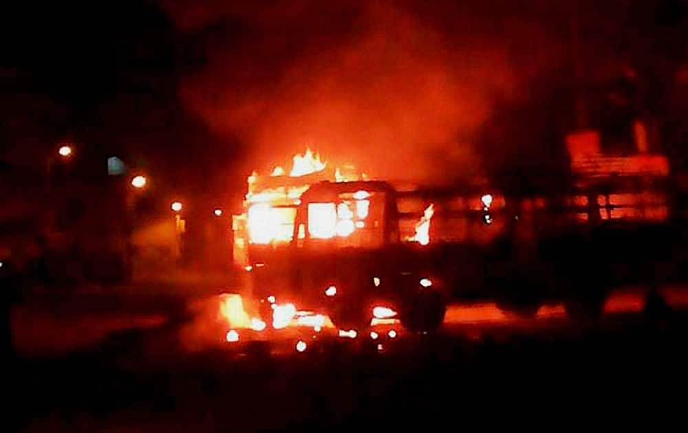 A mob stoned buses and set vehicles on fire after BJP leader and Dadri Nagar Panchayat Chairman Geeta Pandit`s husband Vijay Pandit was shot dead, in Dadri.