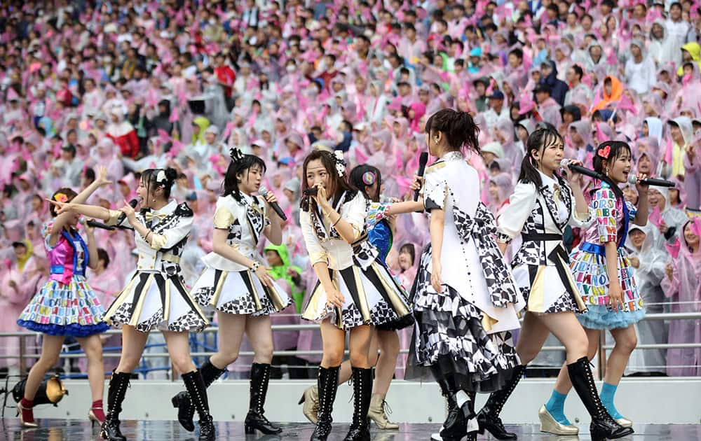 Japan’s all-girl pop idol group AKB48 members perform during the annual AKB48 popularity poll in Tokyo.