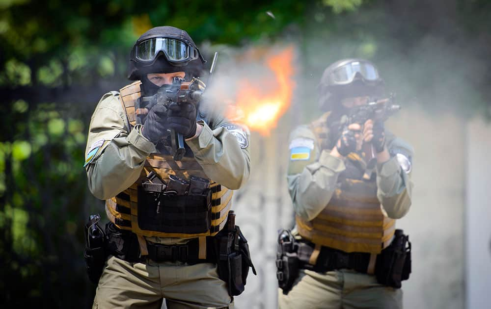 Ukrainian special forces fire during their training outside in Kharkiv, Ukraine. In recent weeks, Ukrainian officials say more than 200 people have died - a figure that could not be independently confirmed - in fighting between Ukrainian government troops and pro-Russian separatists in eastern Ukraine.