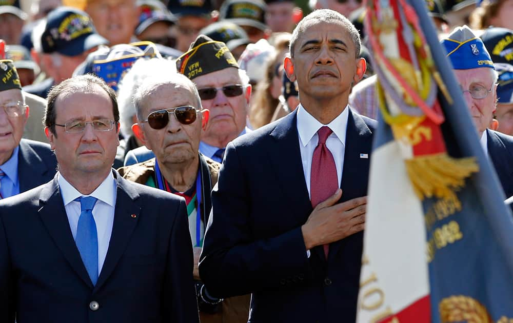 US President Barack Obama and French President Francois Hollande, participate in the 70th French-American commemoration D-Day ceremony at the Normandy American Cemetery and Memorial in Colleville-sur-Mer, France.