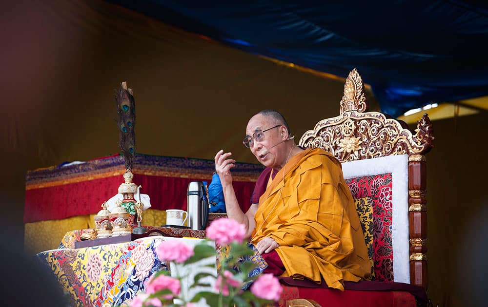 Tibetan spiritual leader the Dalai Lama talks on the third and final day of his annual teaching for Tibetan school and college students at the Tibetan Children`s Village School in Dharmsala.