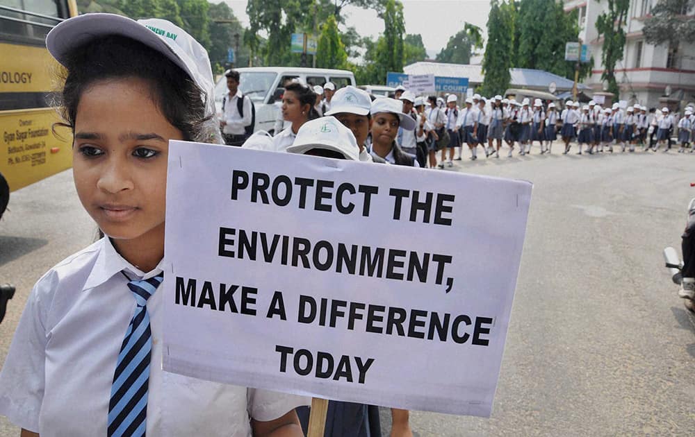 A school student taking part in an awareness rally on the occasion of World Environment Day, in Guwahati.