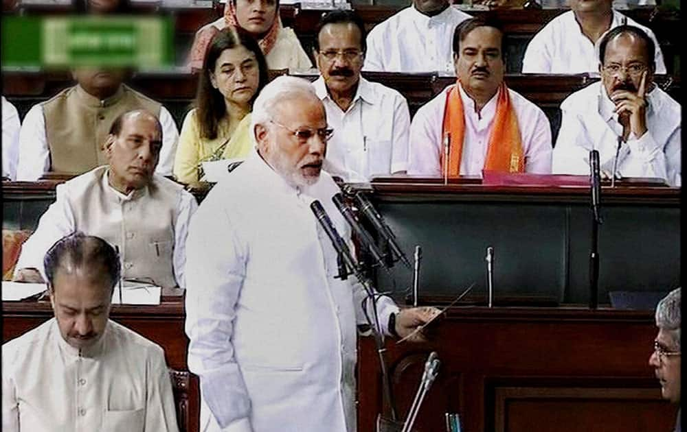 Prime Minister Narendra Modi takes oath as the member of Parliament during the second day of First session of 16th Lok Sabha, in New Delhi.