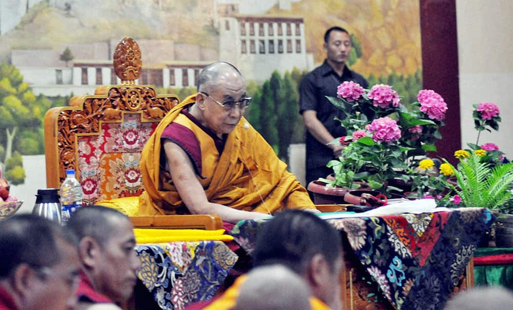 Tibetan spiritual leader Dalai Lama gives lessons at a Tibetan Children` Village School in Dharamsala.