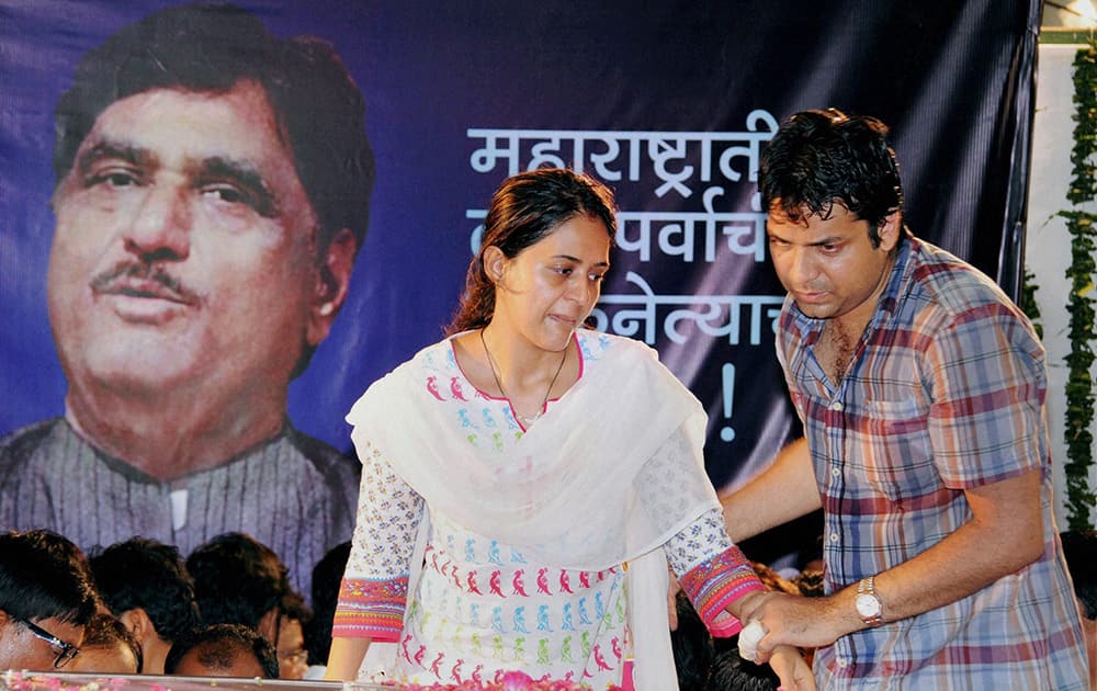 The late BJP leader Gopinath Munde`s daughter Pritam with her husband at BJP office at Nariman Point in Mumbai.