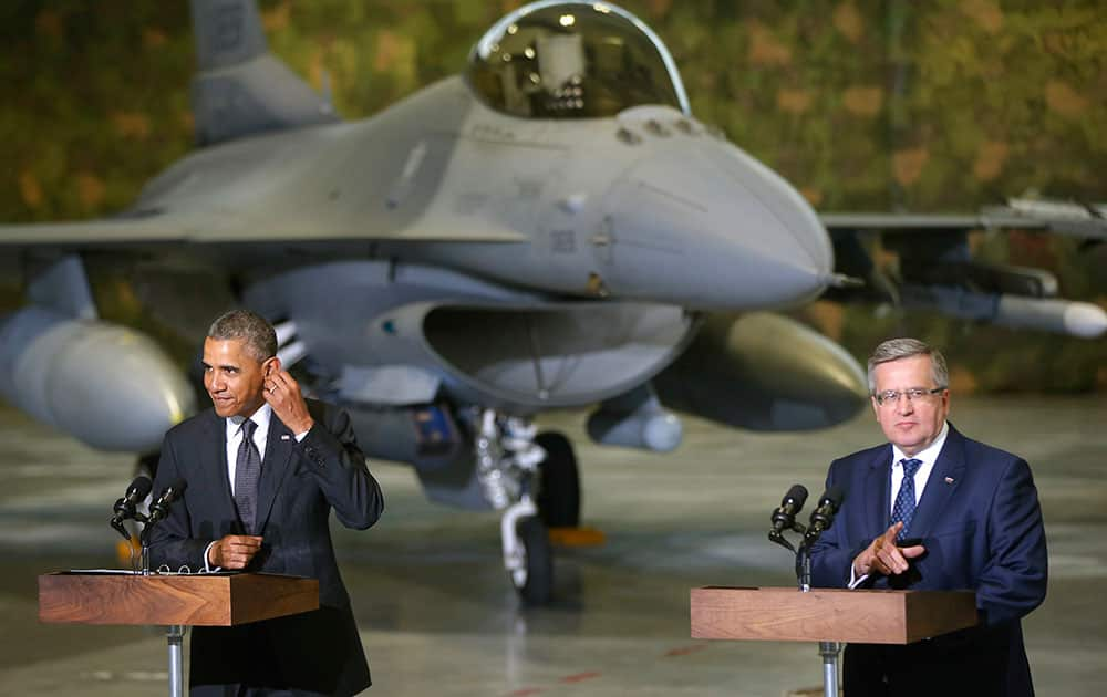 President Barack Obama and Poland`s President Bronislaw Komorowski make statements and meet with US and Polish troops at an event featuring four F-16 fighter jets, two American and two Polish, as part of multinational military exercises, in Warsaw, Poland.