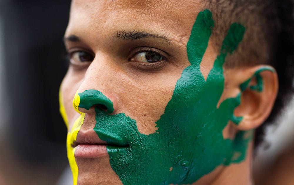 An imate poses for a picture during the opening ceremony of the football championship for prisoners at the Castro Castro Prison, in Lima Peru.