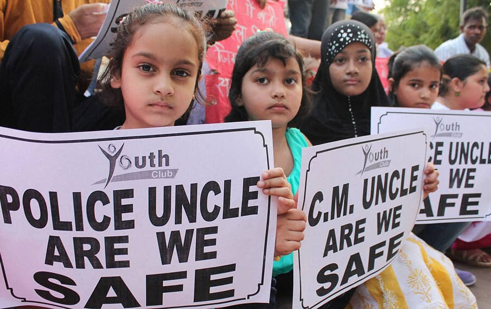 Children during a protest against the rape of girls in Badaun and other places in Uttar Pradesh at GPO in Lucknow.