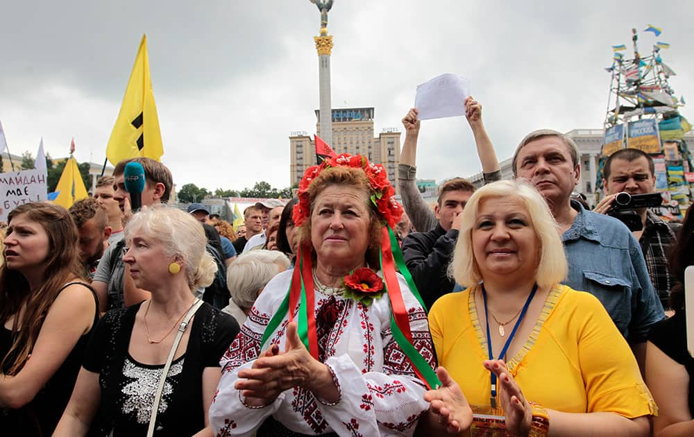 People gather during a rally in Independence Square in Kiev, Ukraine.