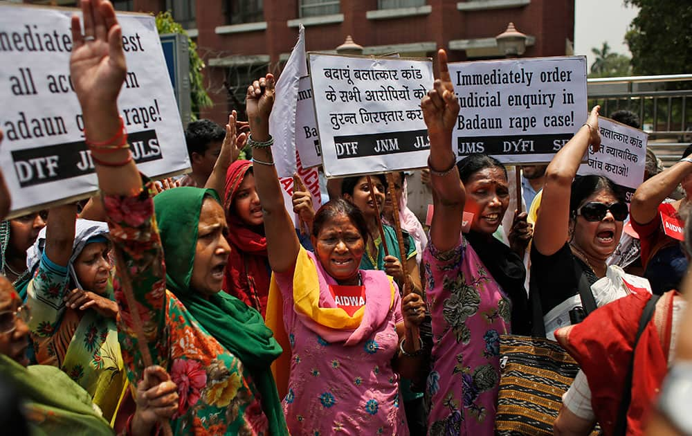 Members of the All India Democratic Women`s Association (AIDWA) shout slogans during a protest against the gang rape of two teenage girls, in New Delhi.