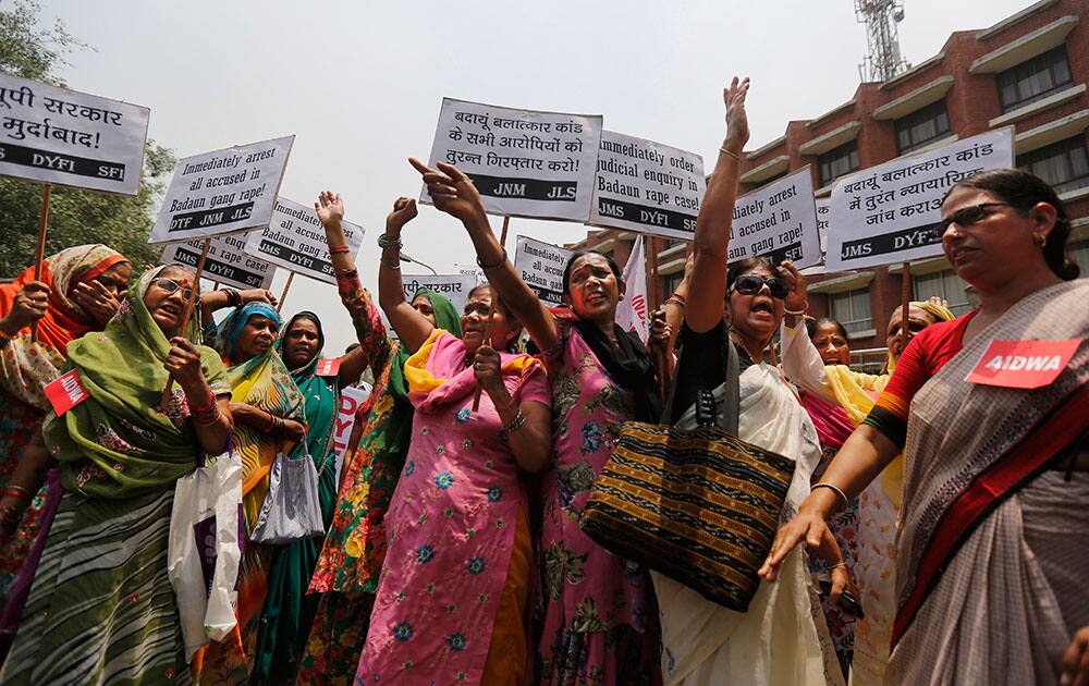 Members of the All India Democratic Women`s Association (AIDWA) shout slogans during a protest against the gang rape of two teenage girls, in New Delhi.