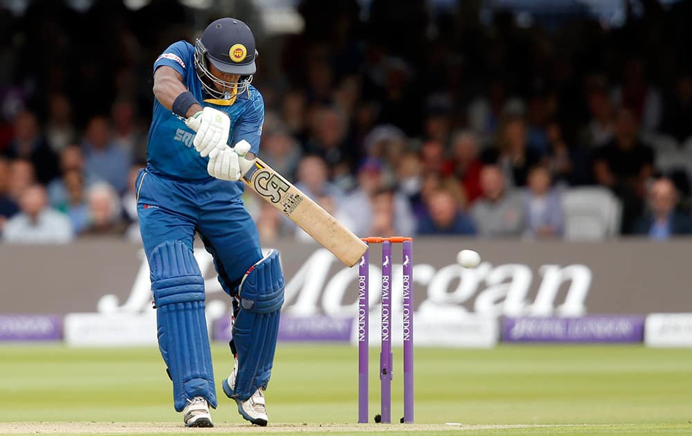 Sri Lanka`s Kusal Perera hits two runs off the bowling of England`s Harry Gurney during their One Day International cricket match at Lord`s cricket ground in London.