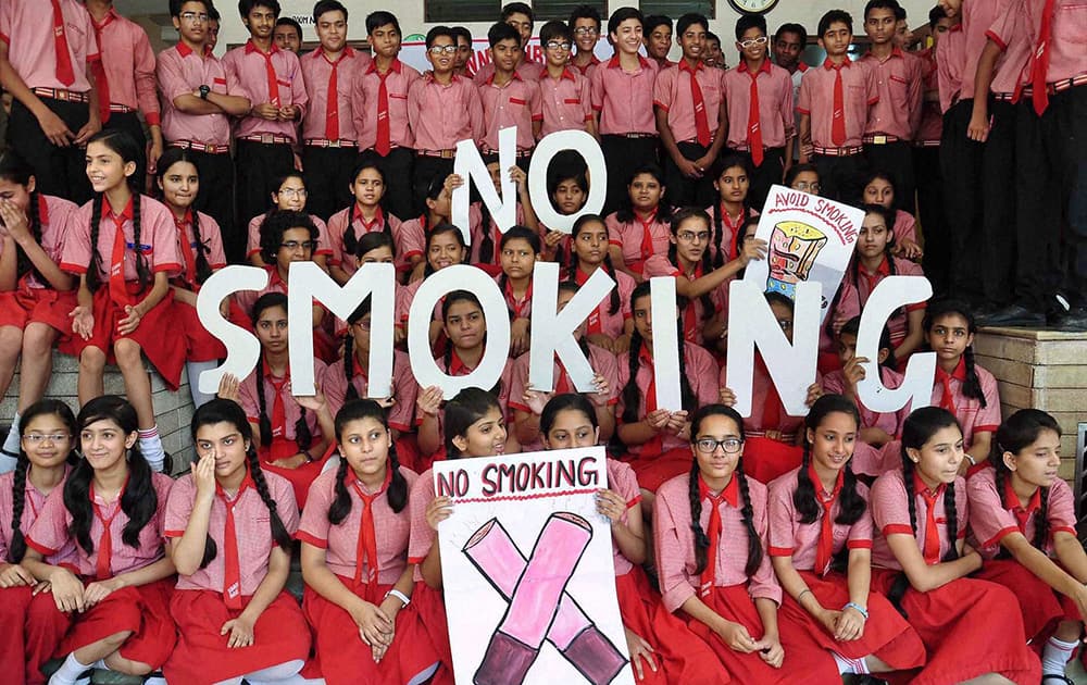 School children observe World No Tobacco Day event.