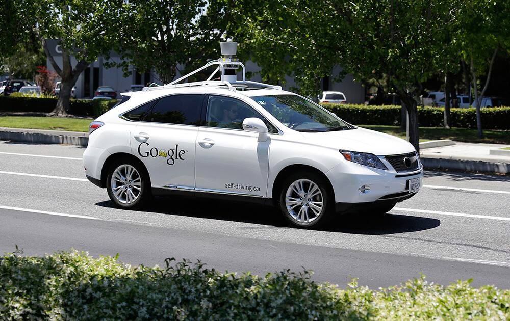 A Google self-driving car goes on a test drive near the Computer History Museum in Mountain View, Calif.