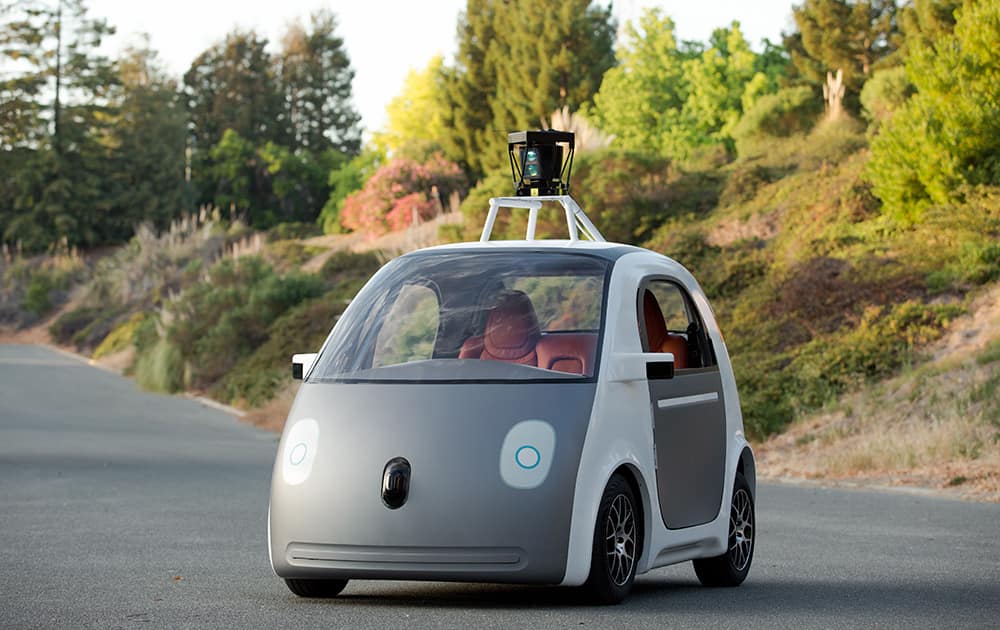 This image provided by Google shows a very early version of Google`s prototype self-driving car. The two-seater won`t be sold publicly, but Google, said it hopes by this time next year, 100 prototypes will be on public roads.