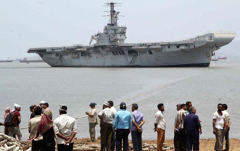 Indian Navy`s first aircraft carrier, INS Vikrant being moved to ship breaking yard in South Mumbai.