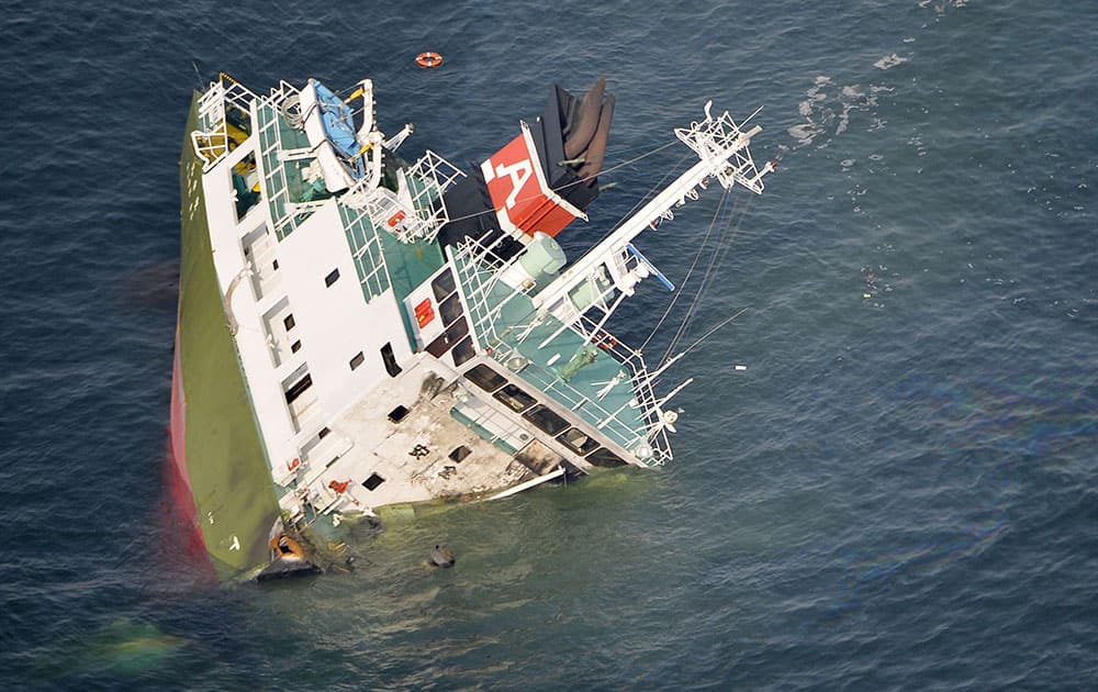 The Shoko Maru, a 998-ton tanker, sinks after it exploded in waters off Himeji port, western Japan.