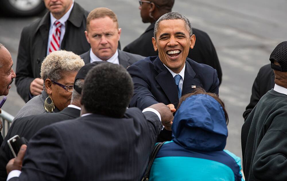 President Barack Obama greets a small crowd gathered at the Stewart Air National Guard Base in Newburgh, N.Y., after delivering the commencement address at the United States Military Academy at West Point.