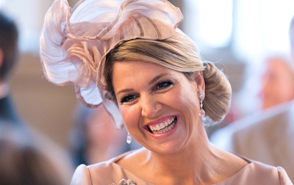The Netherland`s Queen Maxima smiles during the vist to the house of Netherlands in Muenster, Germany.