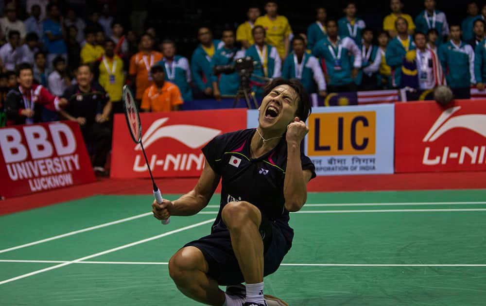 Japan`s Takuma Ueda celebrates after defeating Malaysia`s Daren Liew in the singles final of the Thomas Cup badminton championship in New Delhi.