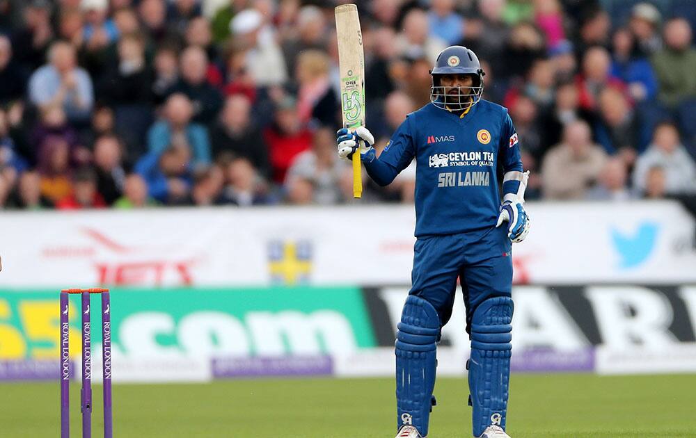 Sri Lanka`s Tillakaratne Dilshan celebrates scoring 50 during their One Day cricket match between England and Sri Lanka at the Riverside cricket ground, Chester-le-Street, England.