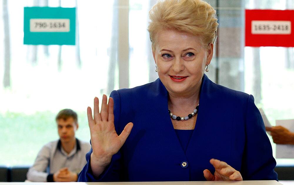 Lithuania`s President Dalia Grybauskaite and presidential candidate, votes at a polling station during the second round of voting in presidential elections in Vilnius, Lithuania.