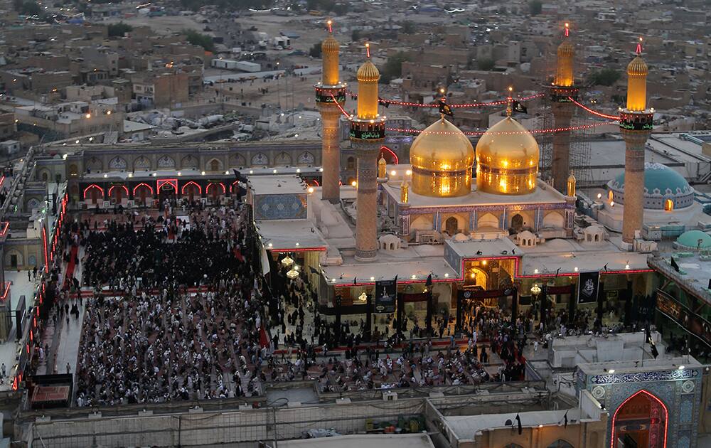 An aerial view of the holy Muslim Shiite shrine of Imam Moussa al-Kadhim, as pilgrims gather during preparations for the annual commemoration of the saint`s death in the Shiite district of Kazimiyah in Baghdad, Iraq.
