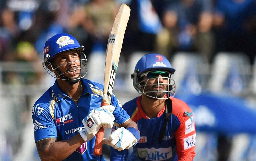 L Simmons of Mumbai Indians plays a shot during an IPL 7 match against Delhi Daredevils in Mumbai.