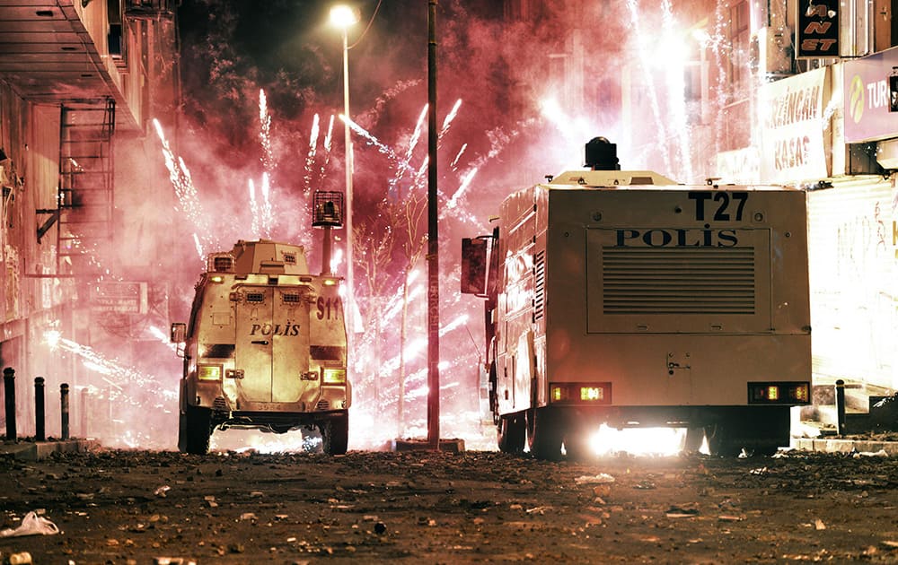 Riot police use water cannons and teargas to disperse people who were protesting the Soma mine disaster that killed 301 miners, in Istanbul, Turkey. Two protesters were seriously injured during clashes.