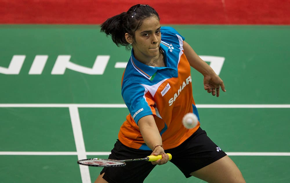 Saina Nehwal returns a shot to Indonesia’s Lindaweni Fanetri during their quarter final match of women`s singles event at the Uber Cup Badminton in New Delhi.