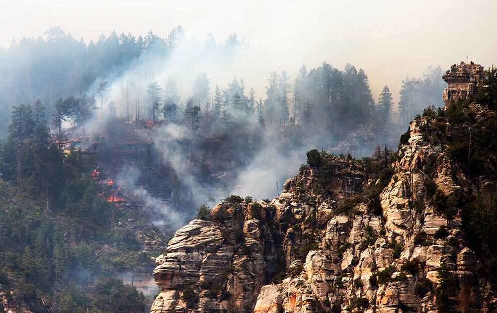 The Slide Fire burns near 89 A south of Flagstaff. Evacuations of surrounding areas took place late afternoon Tuesday. 