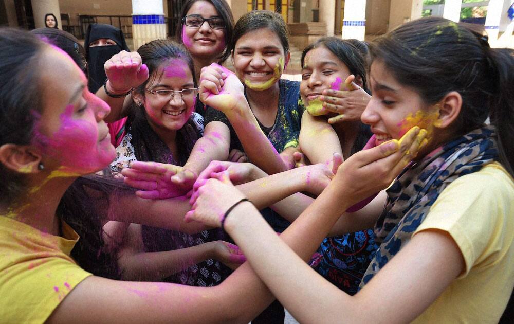 Jubilant students after the declaration of CBSE class X results in Moradabad.