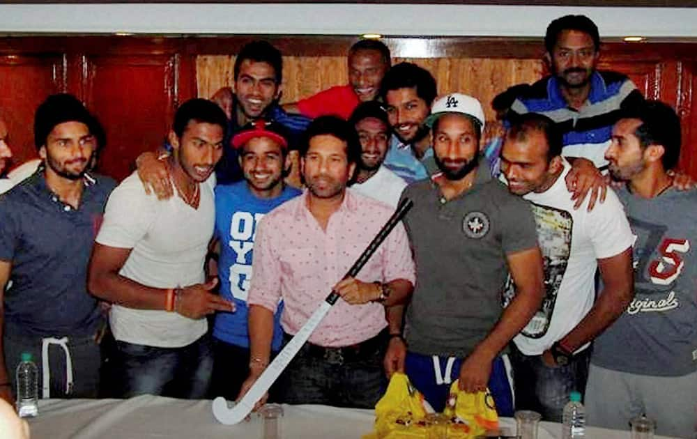 Cricket legend Sachin Tendulkar visiting the World Cup-bound Indian hockey team in New Delhi on Tuesday ahead of the side`s departure for the quadrennial event to be held at The Hague, Netherlands from May 31 to June 15. 