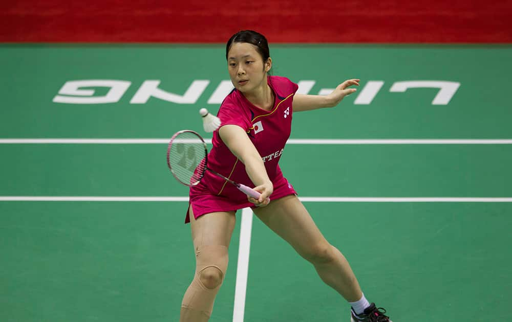 Japan`s Minatsu Mitani plays a shot to Germany`s Karin Schnaase during their women`s singles match of the Uber Cup Badminton in New Delhi.