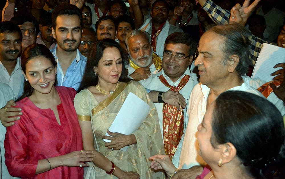 Bollywood actress and BJP candidate Hemamalini along with her daughter Esha Deol and son-in-law Bharat leaving from the counting station after getting certificate of win in Lok Sabha elections in Mathura.